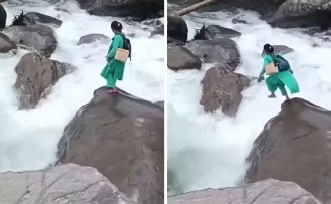 ممرضة هندية تخاطر بحياتها لعبور نهر جارف لإيصال جرعة تطعيم لرضيع