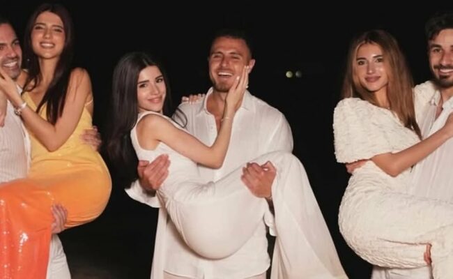 بالصورة: رامي حمدان يعلن خطوبته على سيدرا بيوتي في عرض رومانسي على شاطئ البحر