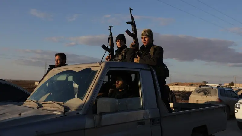 عناصر من الجيش السوري في الرقة