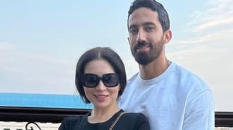 مي عز الدين وزوجها